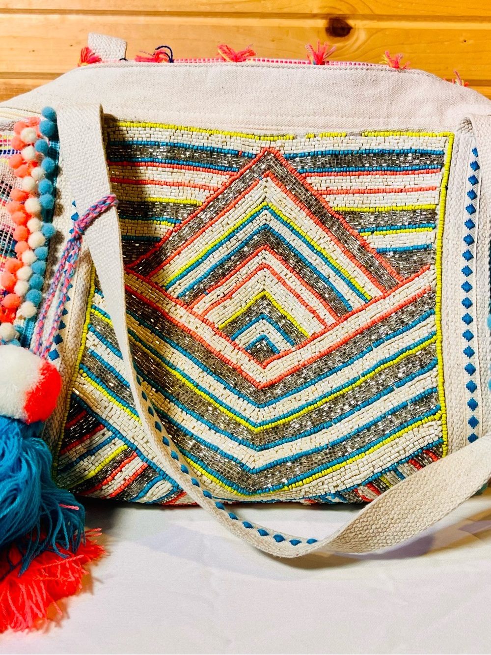 America & Beyond Multicolor Embroidered Canvas Tote with Pom Tassel Accent